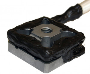 Ruggedized miniature triaxial force transducer